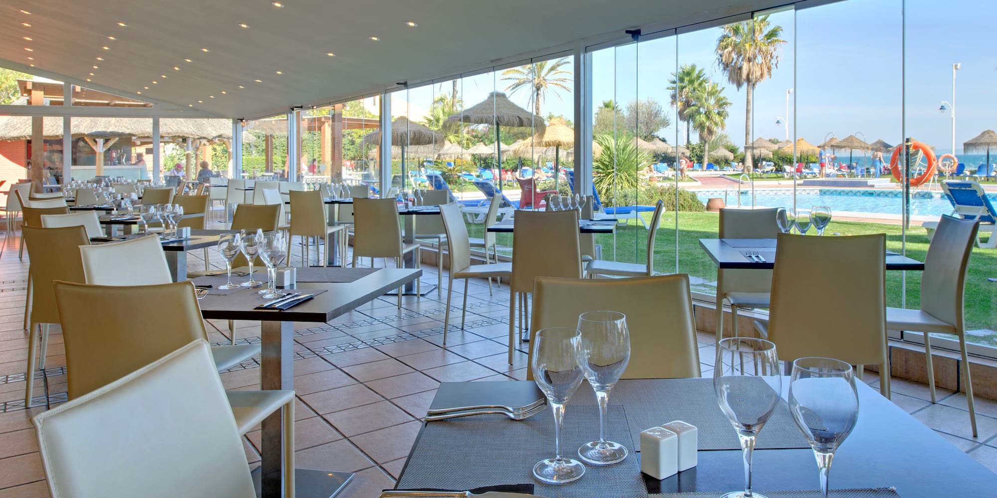 a restaurant with tables and chairs