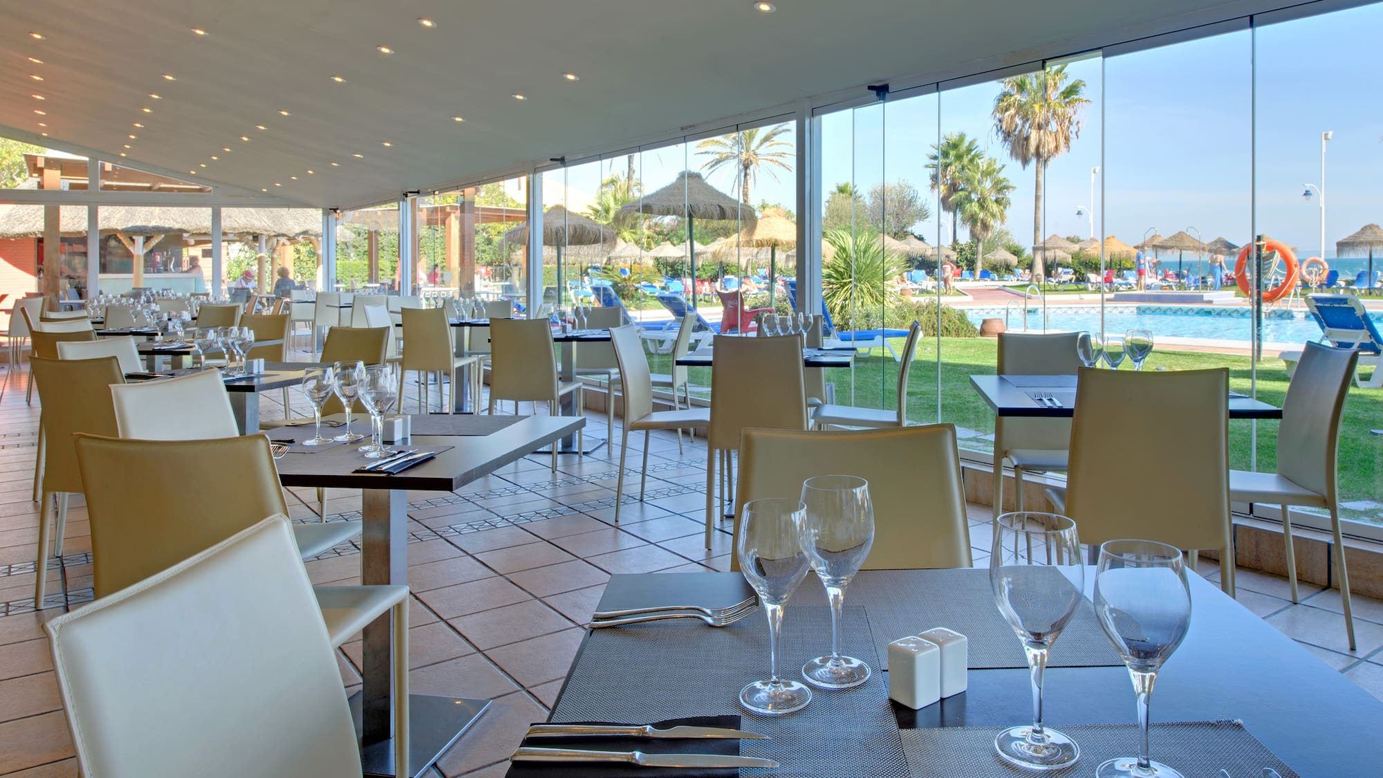 a restaurant with tables and chairs
