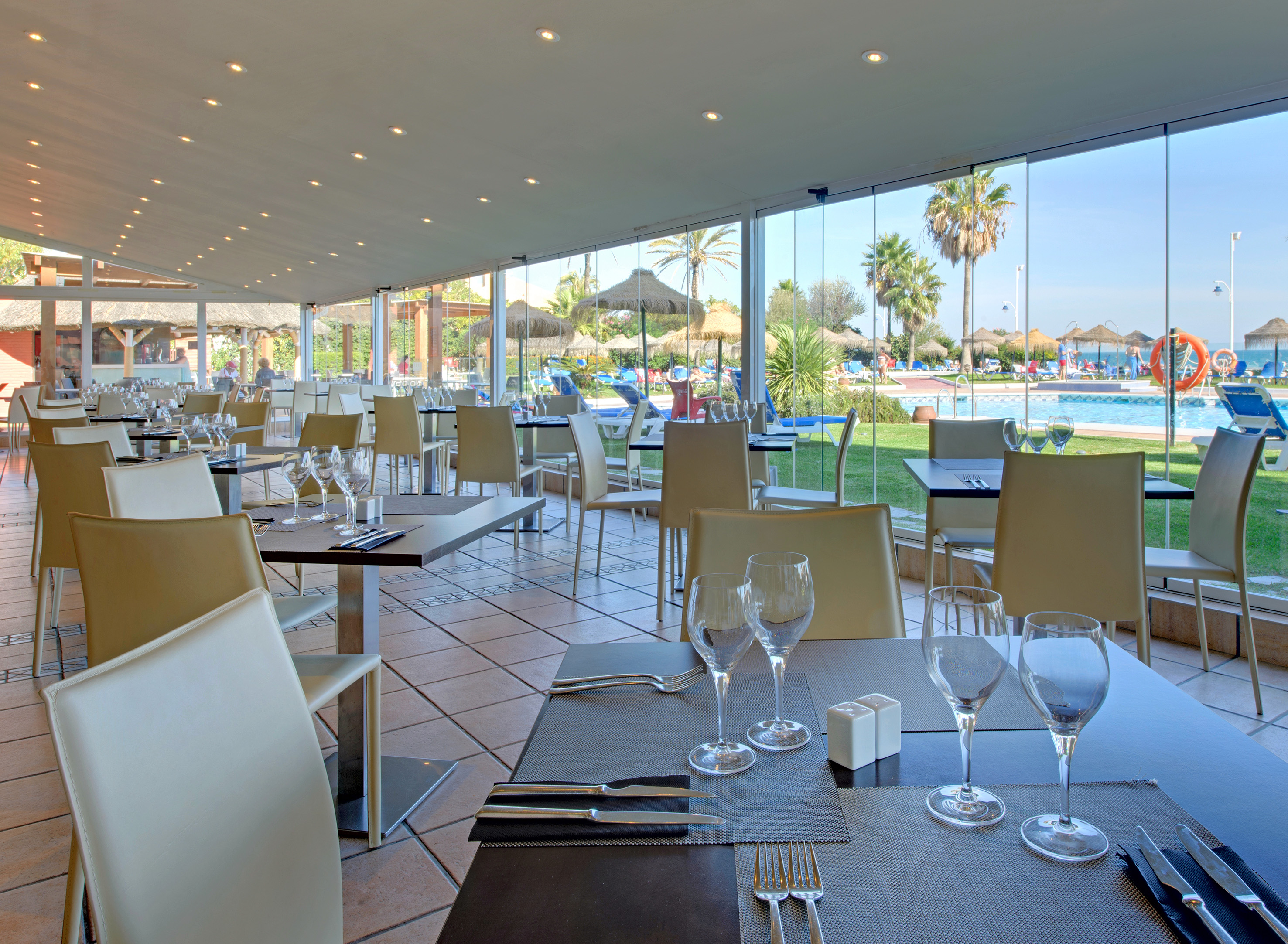 a restaurant with tables and chairs