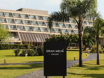 a sign in front of a building