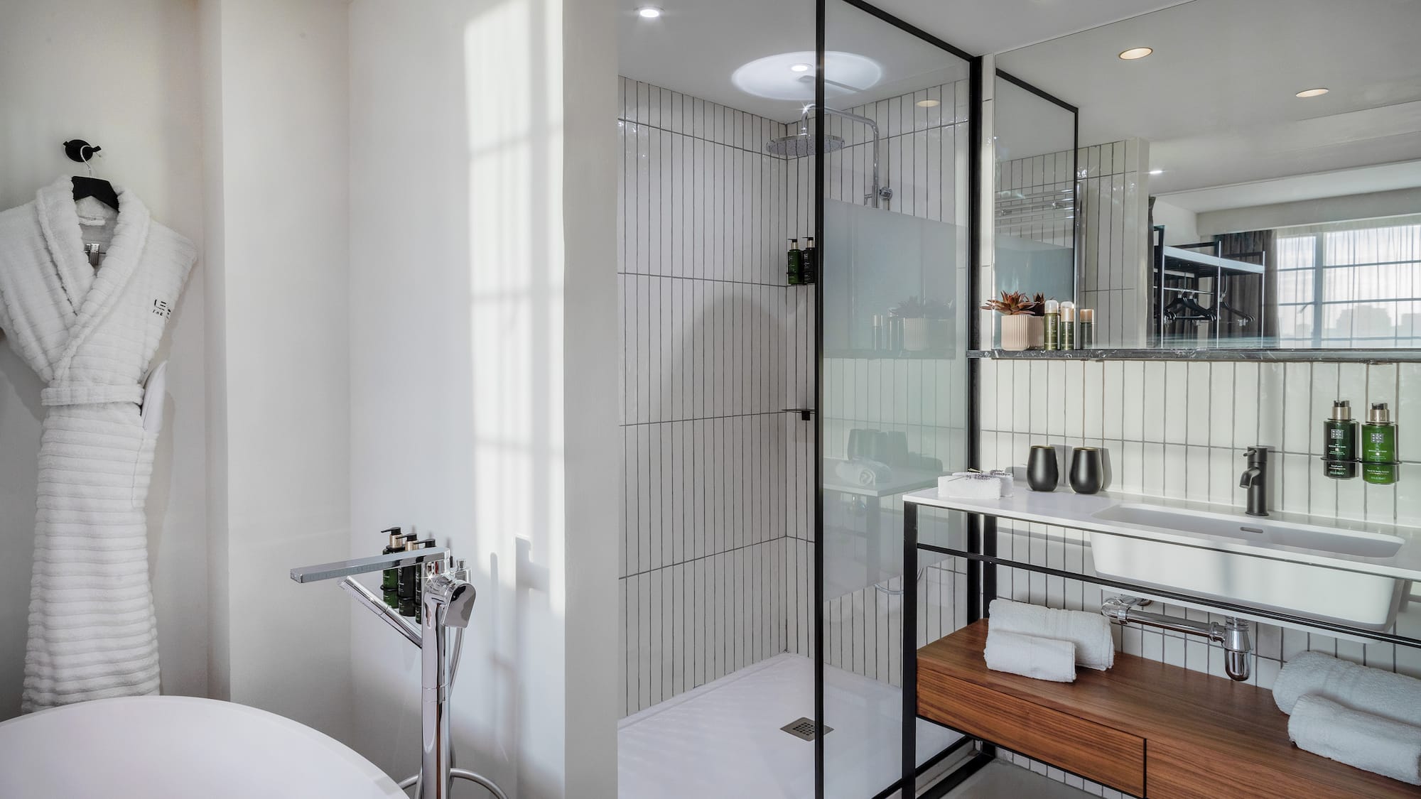 a bathroom with a tub and shower