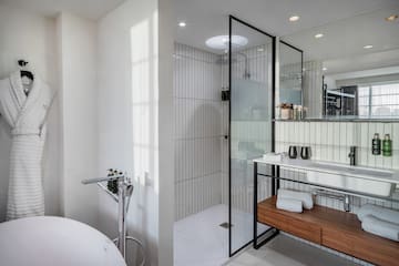 a bathroom with a sink and shower