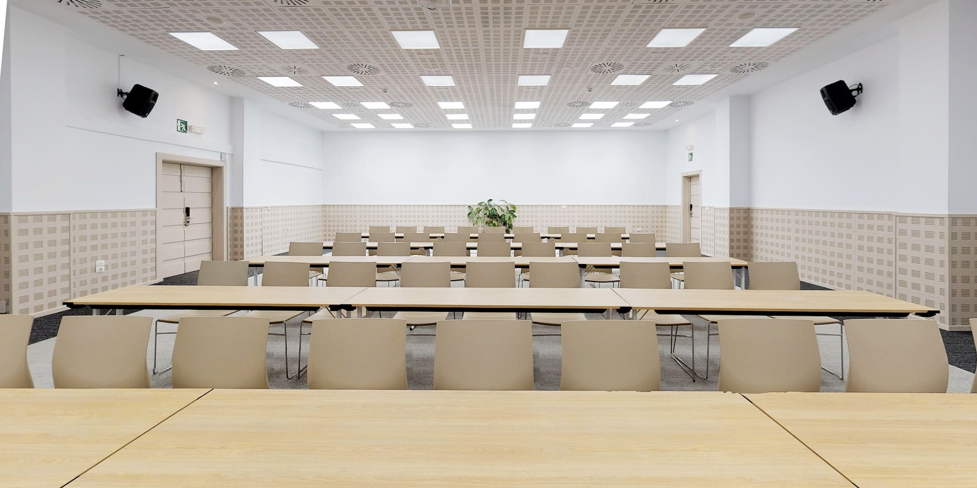 a room with tables and chairs