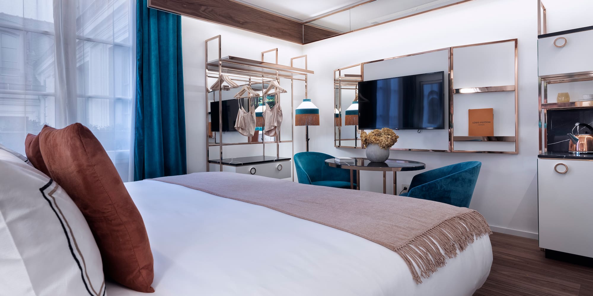 a bedroom with a bed and a table