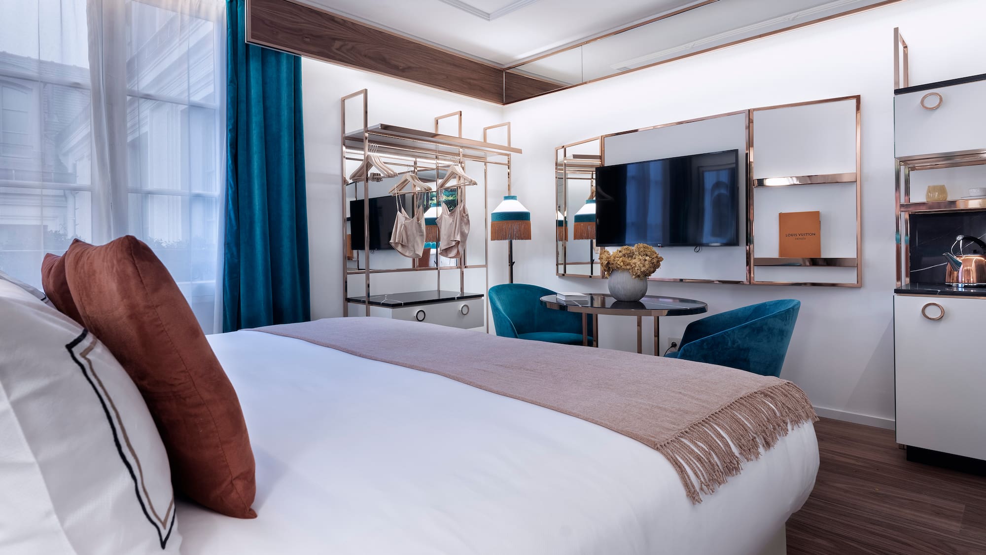 a bedroom with a bed and a table