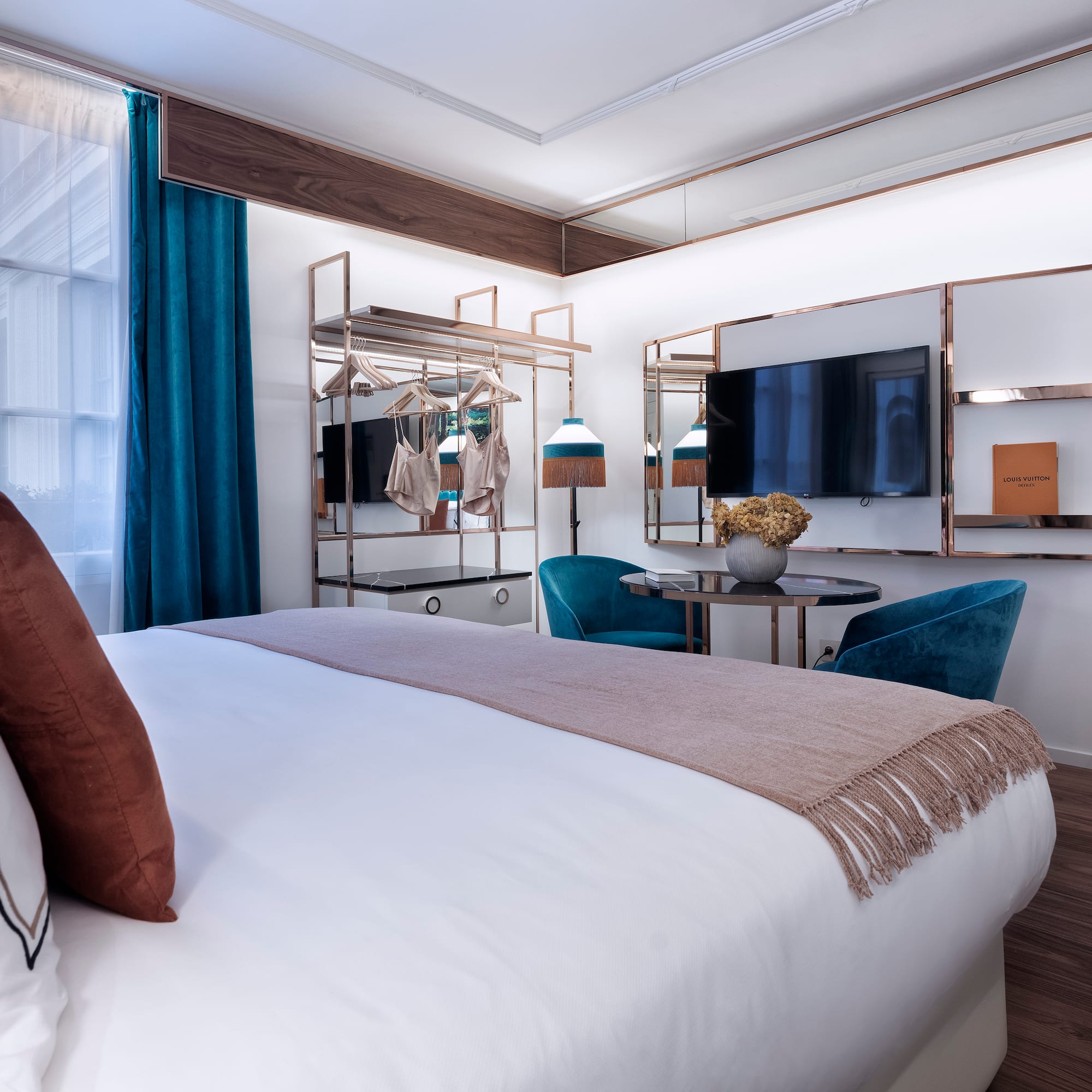 a bedroom with a bed and a table