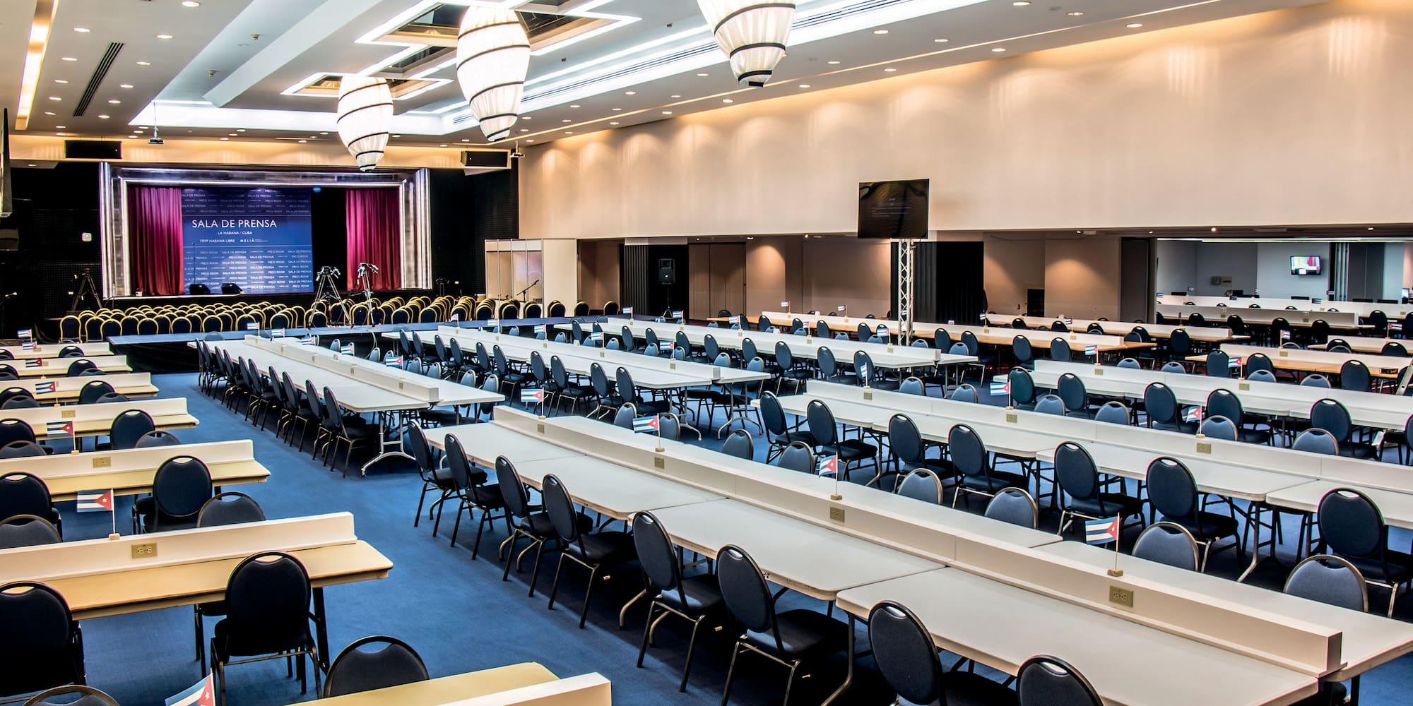 a room with tables and chairs