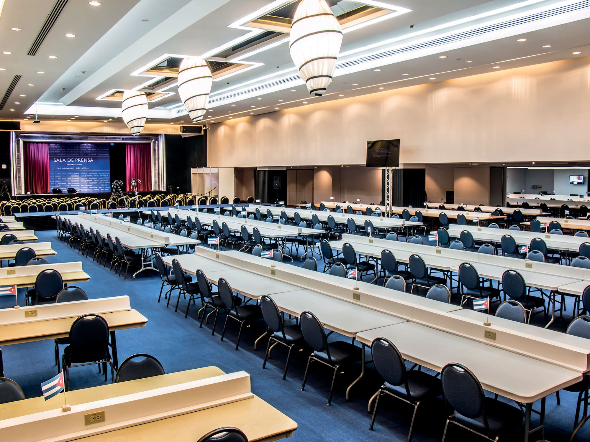 a room with tables and chairs
