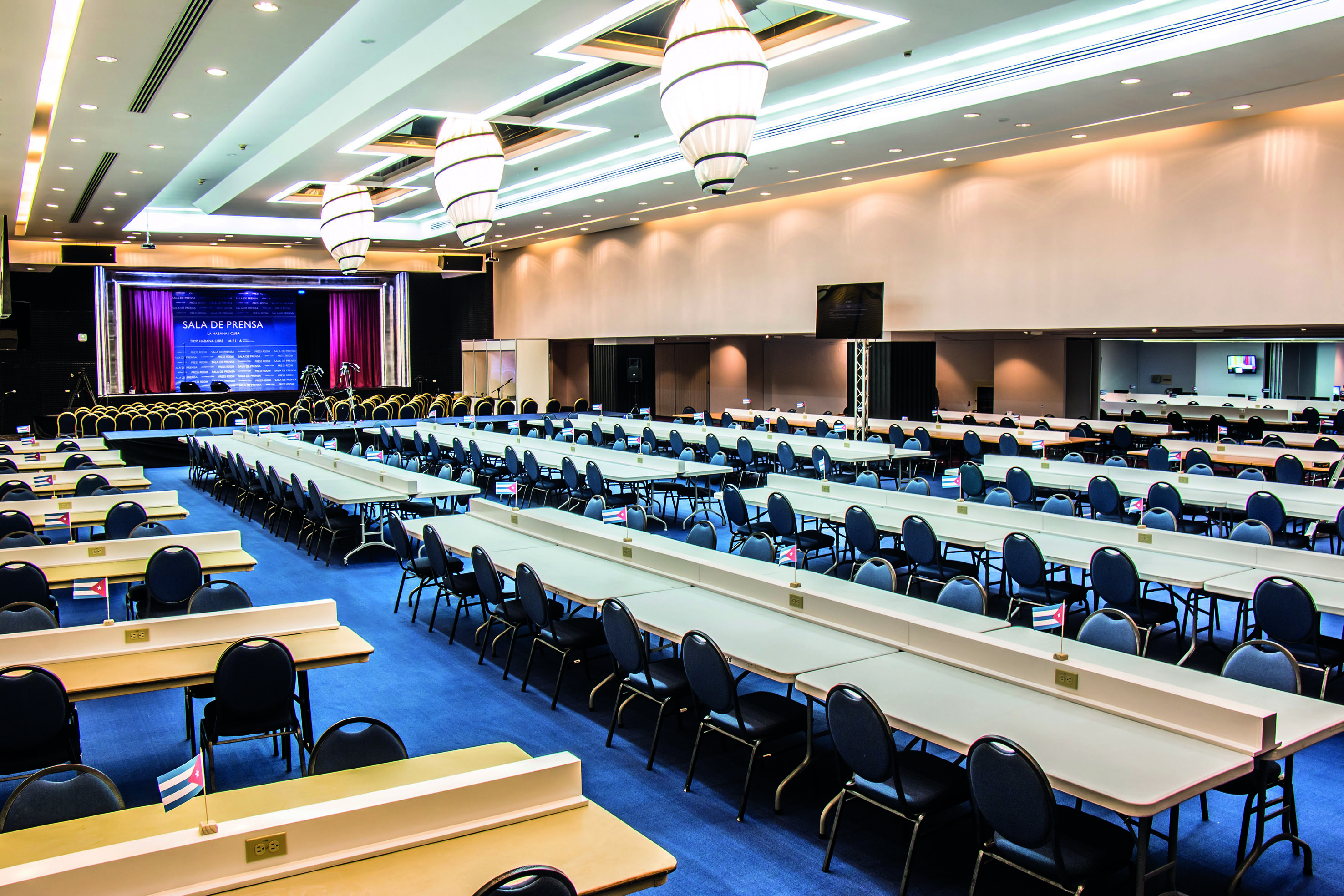 a room with tables and chairs