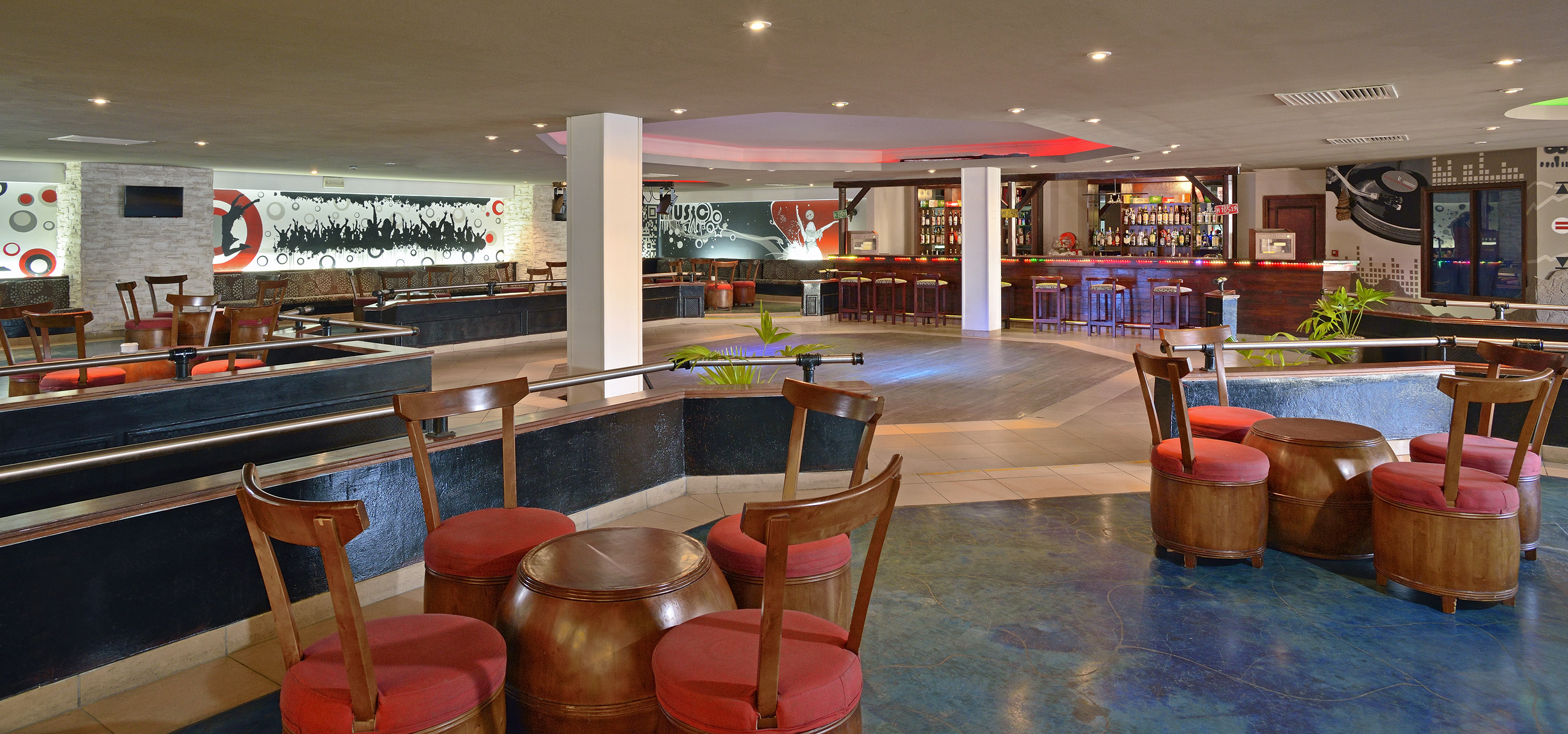 a room with chairs and tables