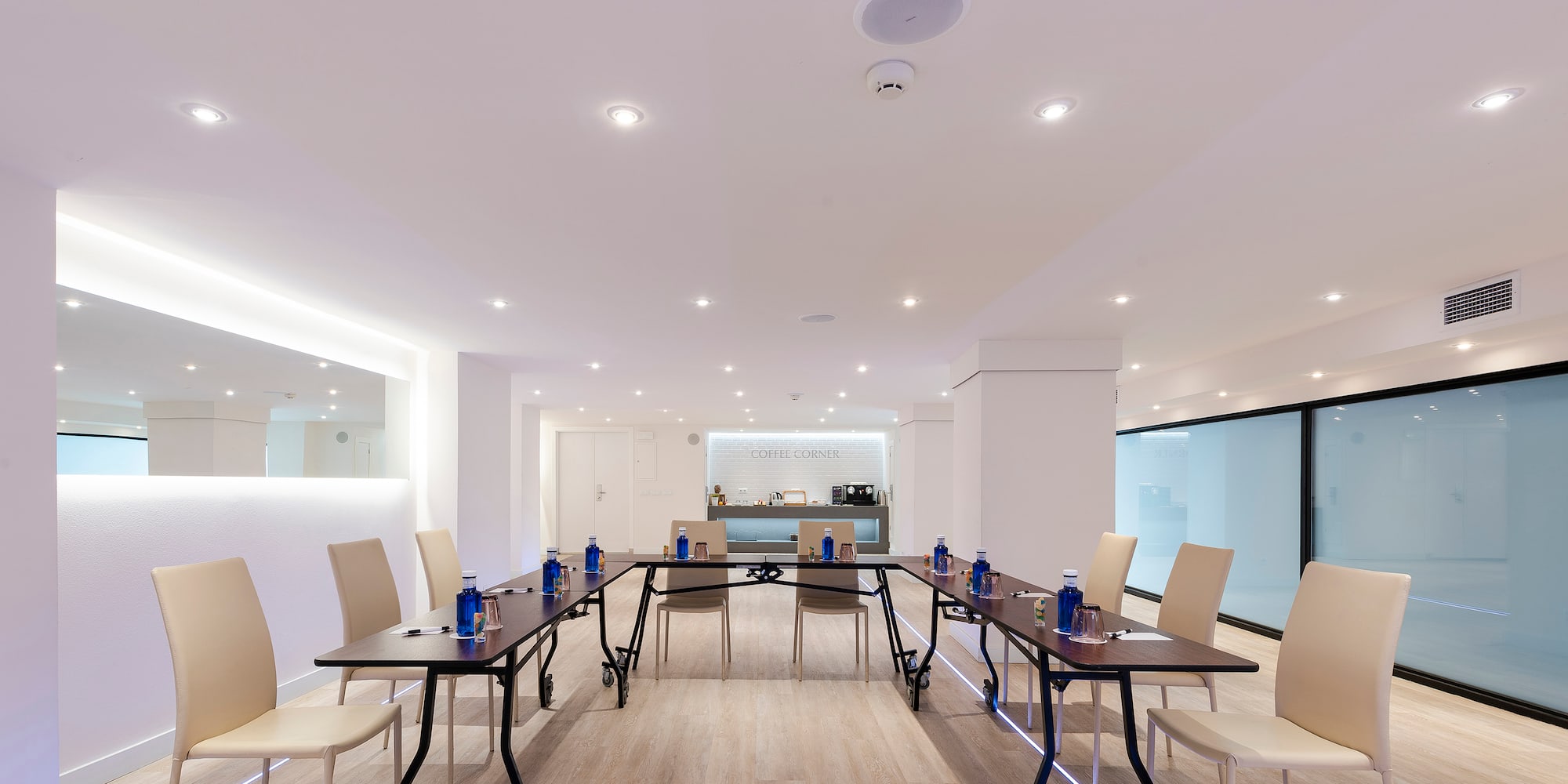 a room with tables and chairs