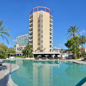 a pool with a building in the background