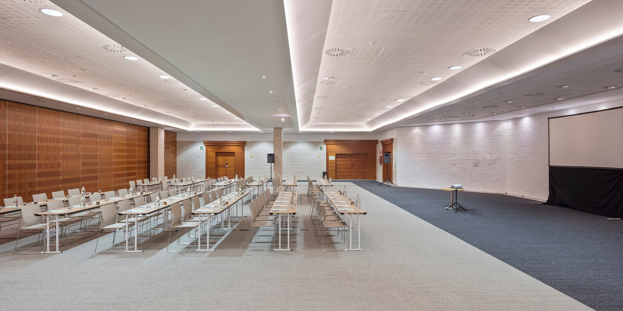 a room with tables and chairs