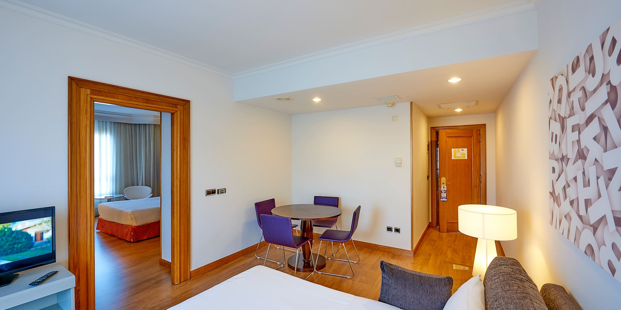 a room with a table and chairs