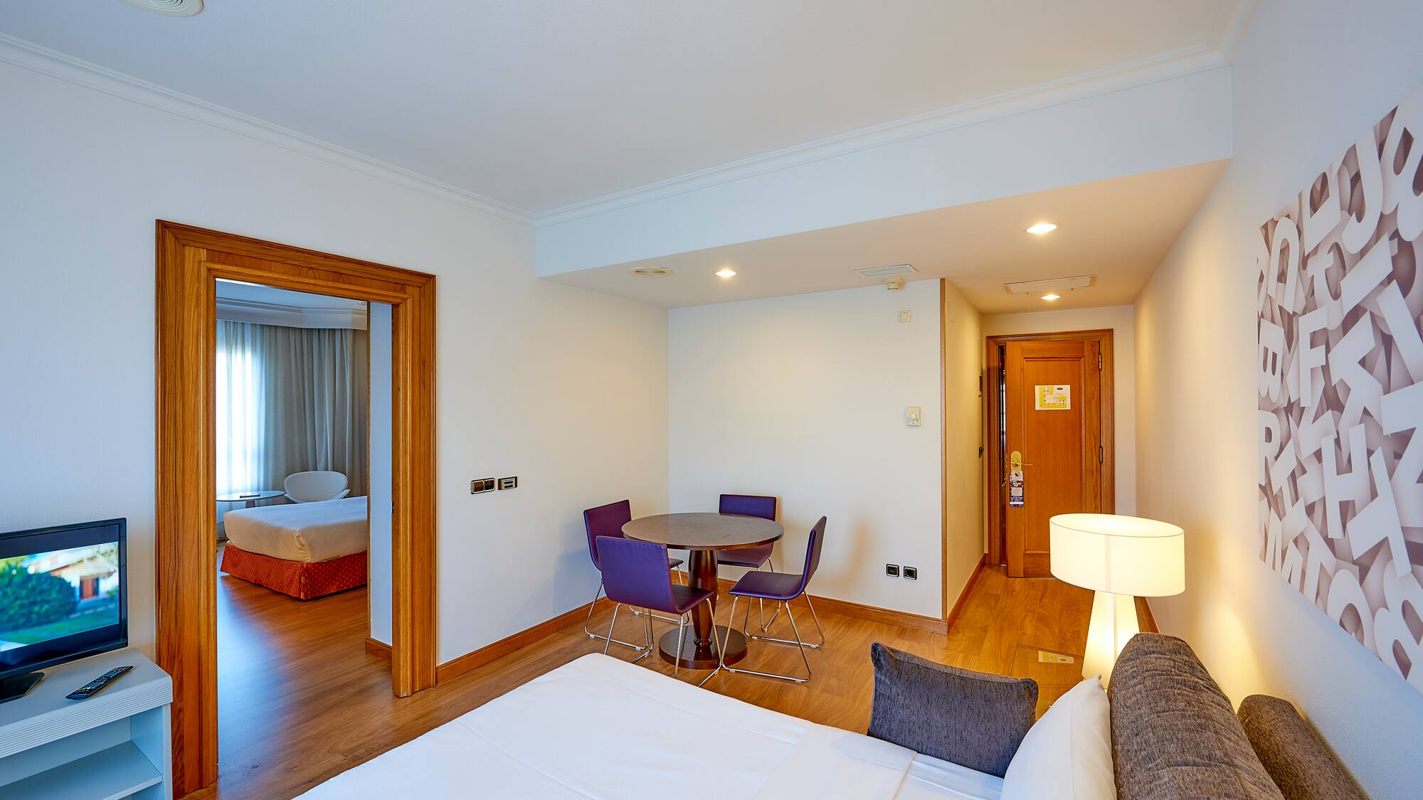 a room with a table and chairs