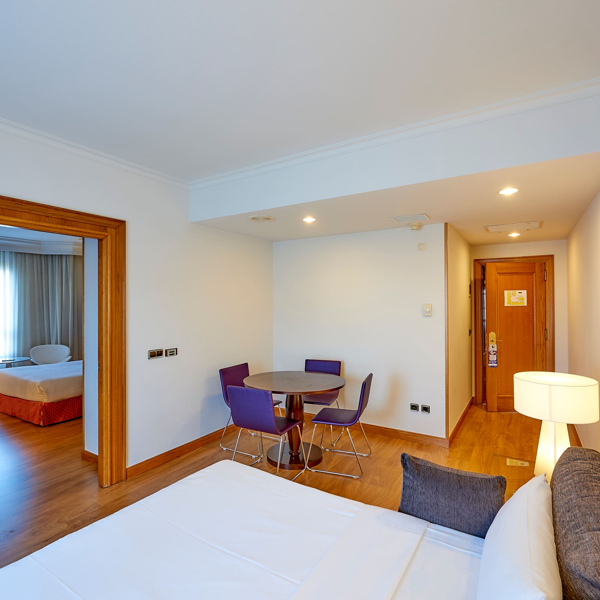 a room with a table and chairs