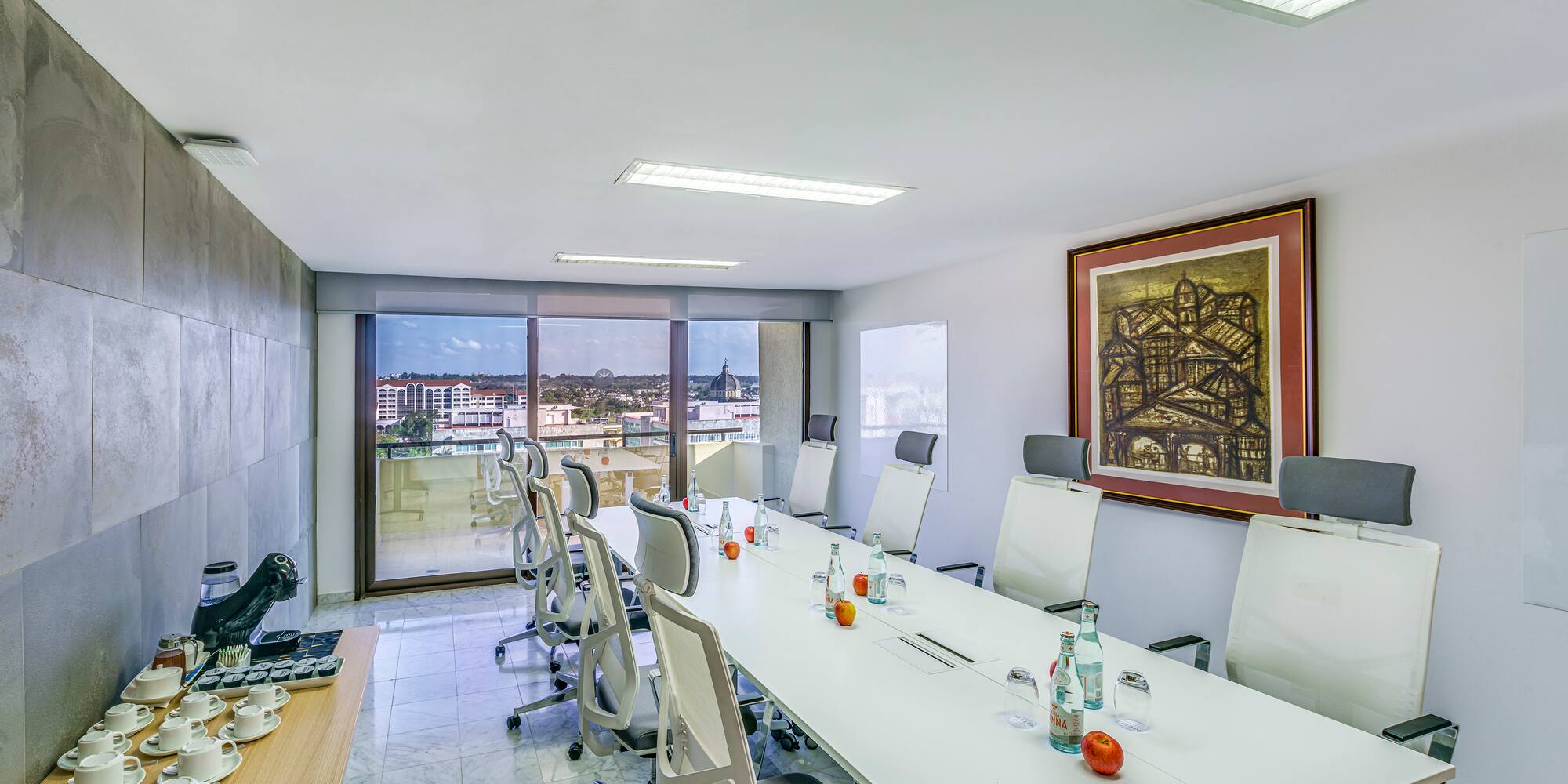 a conference room with a table and chairs
