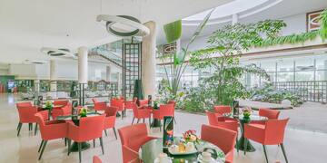 a room with tables and chairs