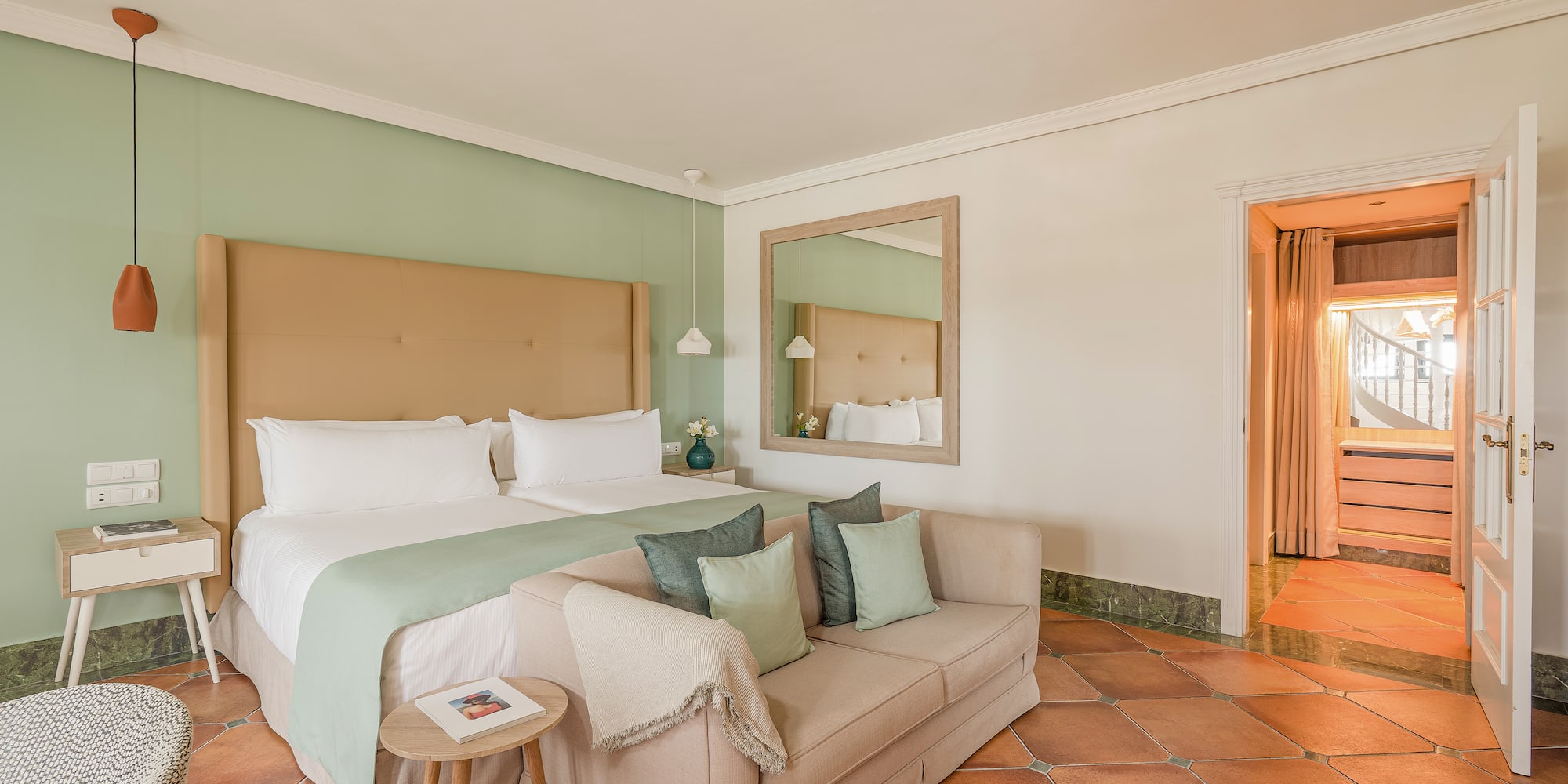 a room with a bed and a couch