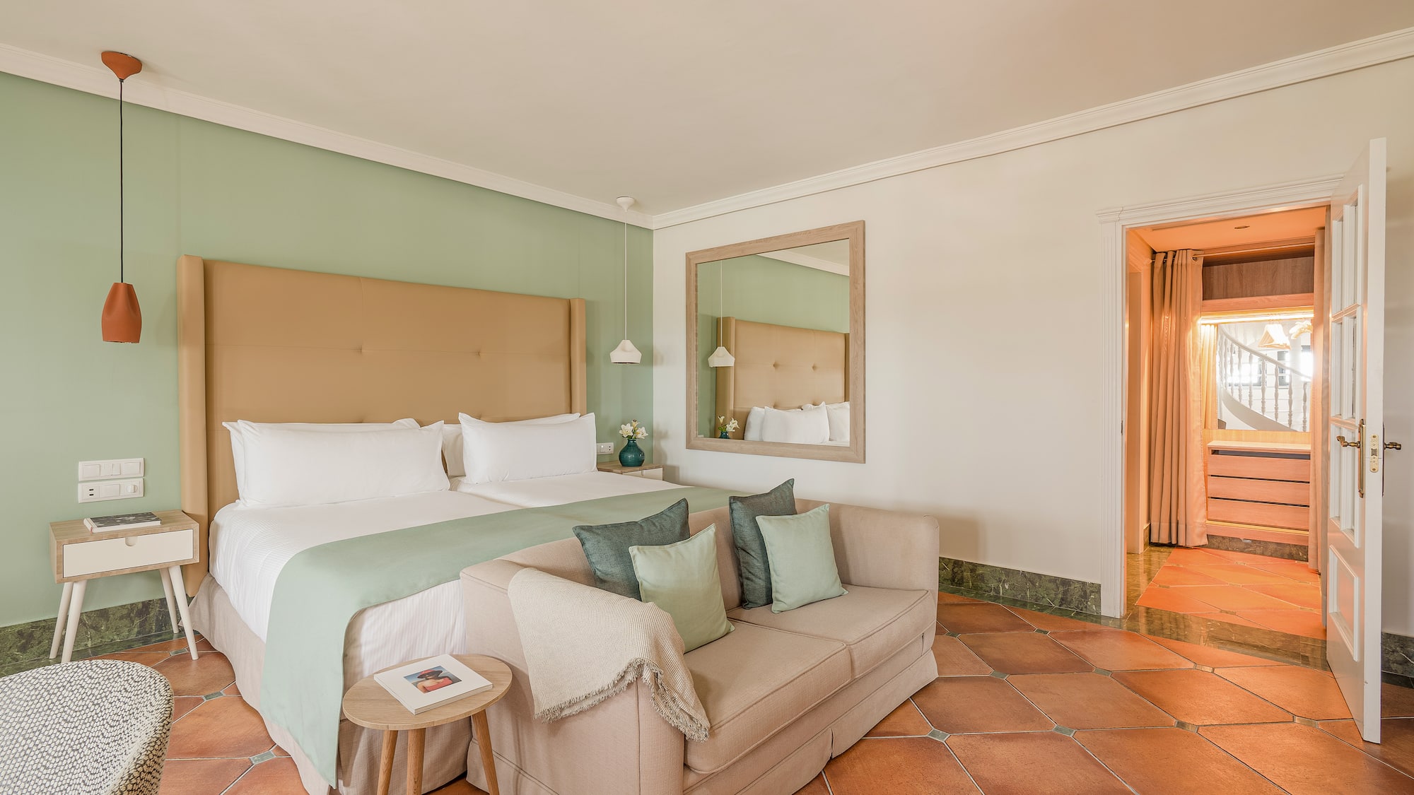 a room with a bed and a couch