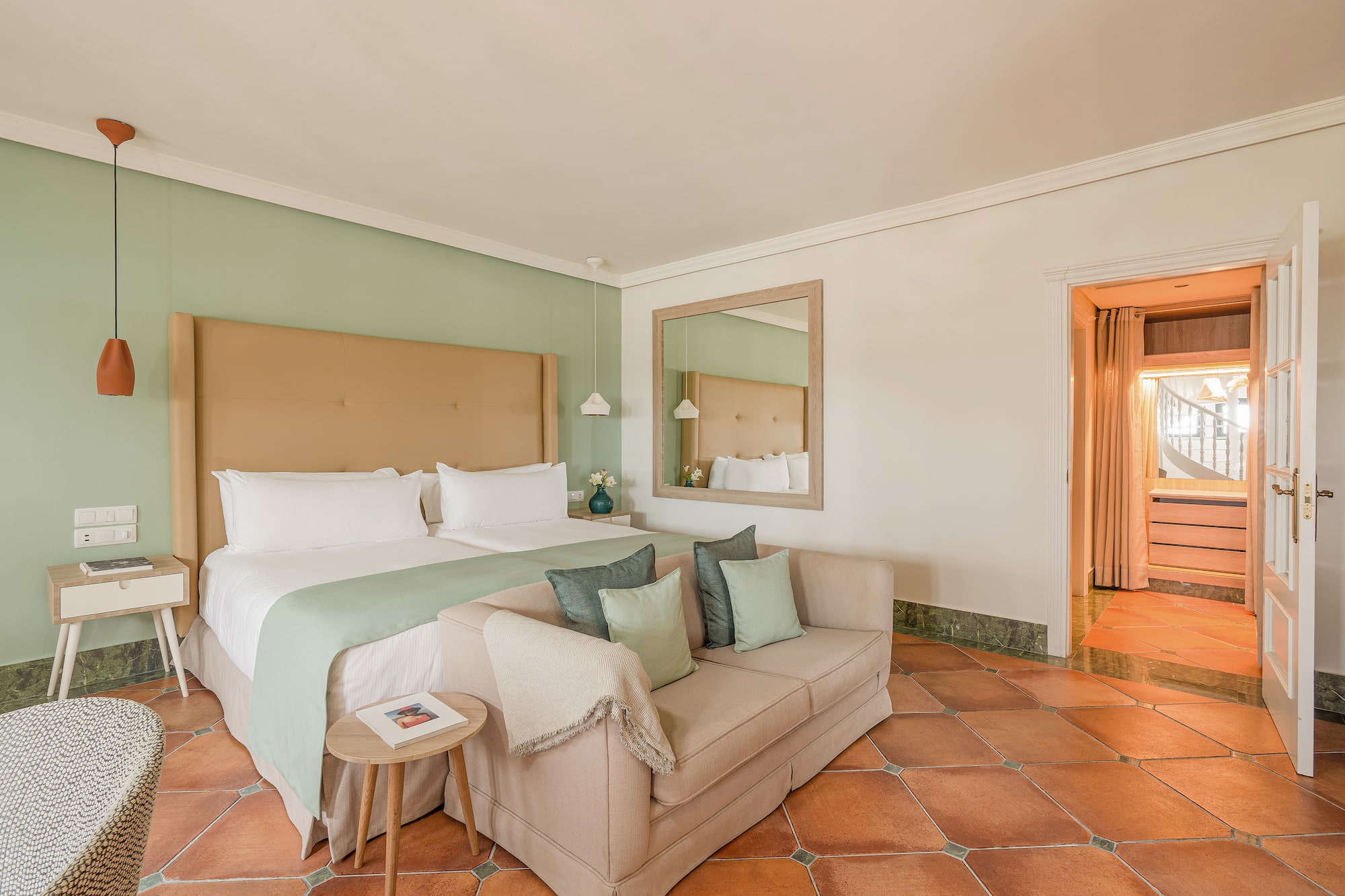 a room with a bed and a couch