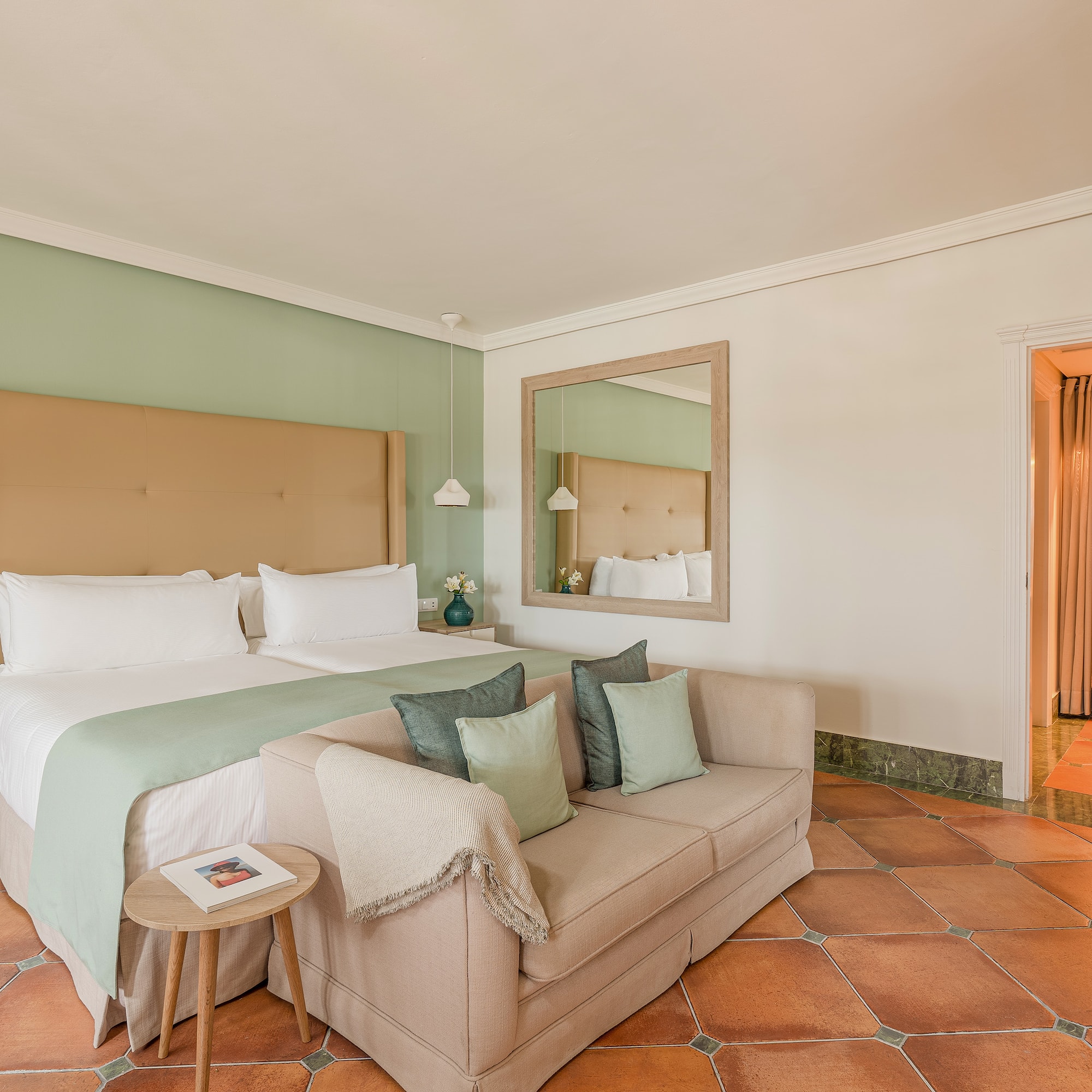 a room with a bed and a couch