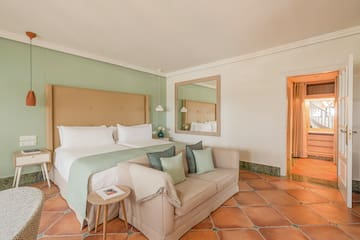 a room with a bed and a couch