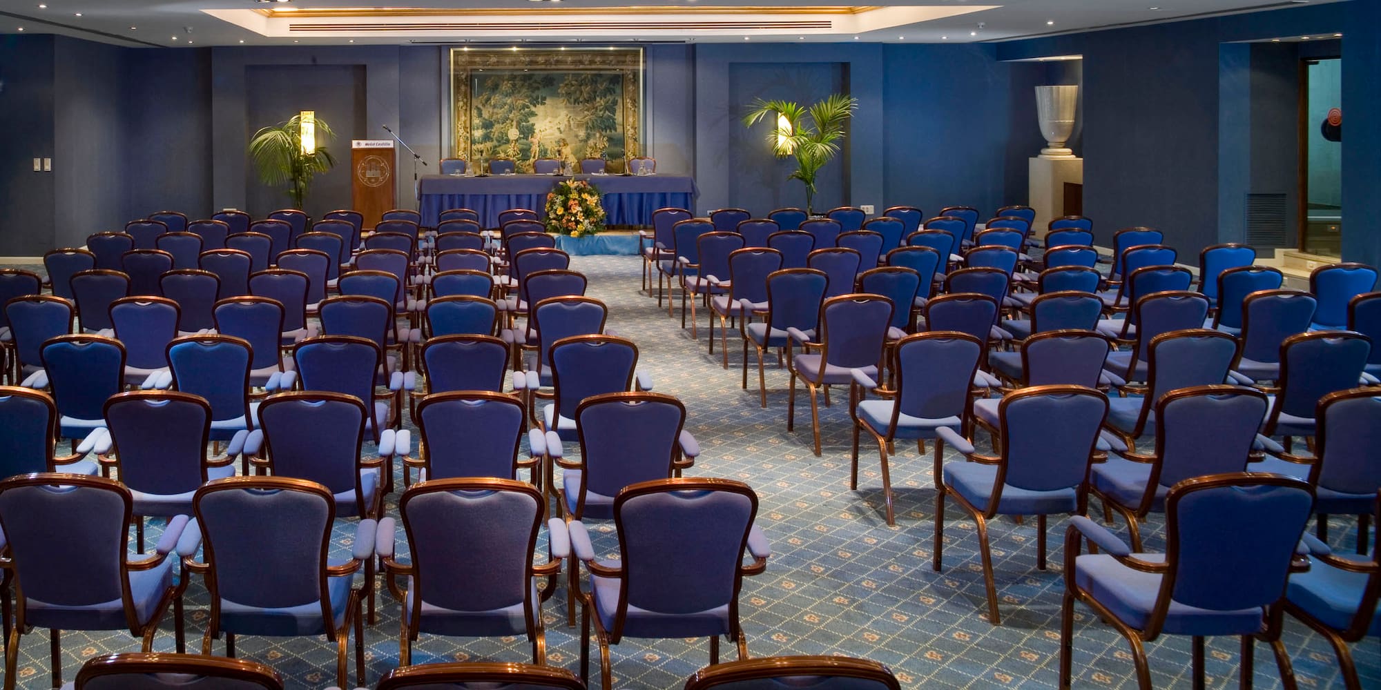 a room with blue chairs