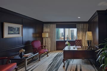 a room with a desk and chair