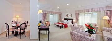 a room with a bed and a desk