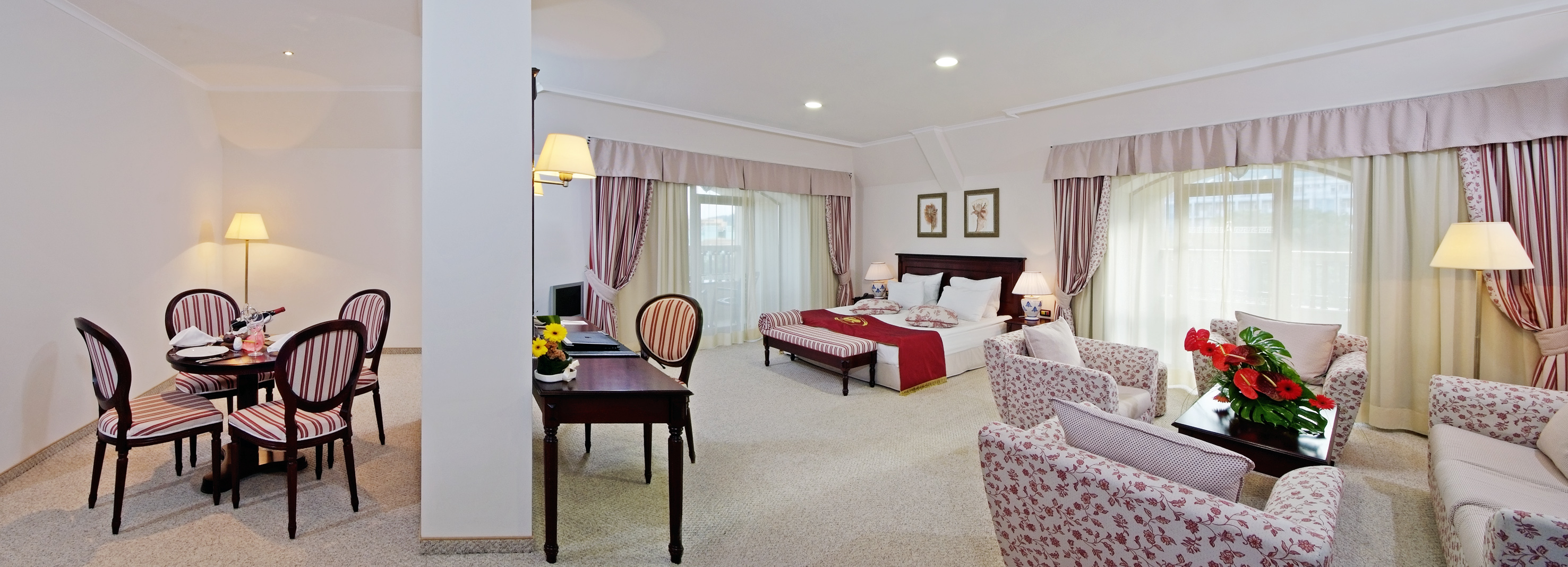 a room with a bed and a desk