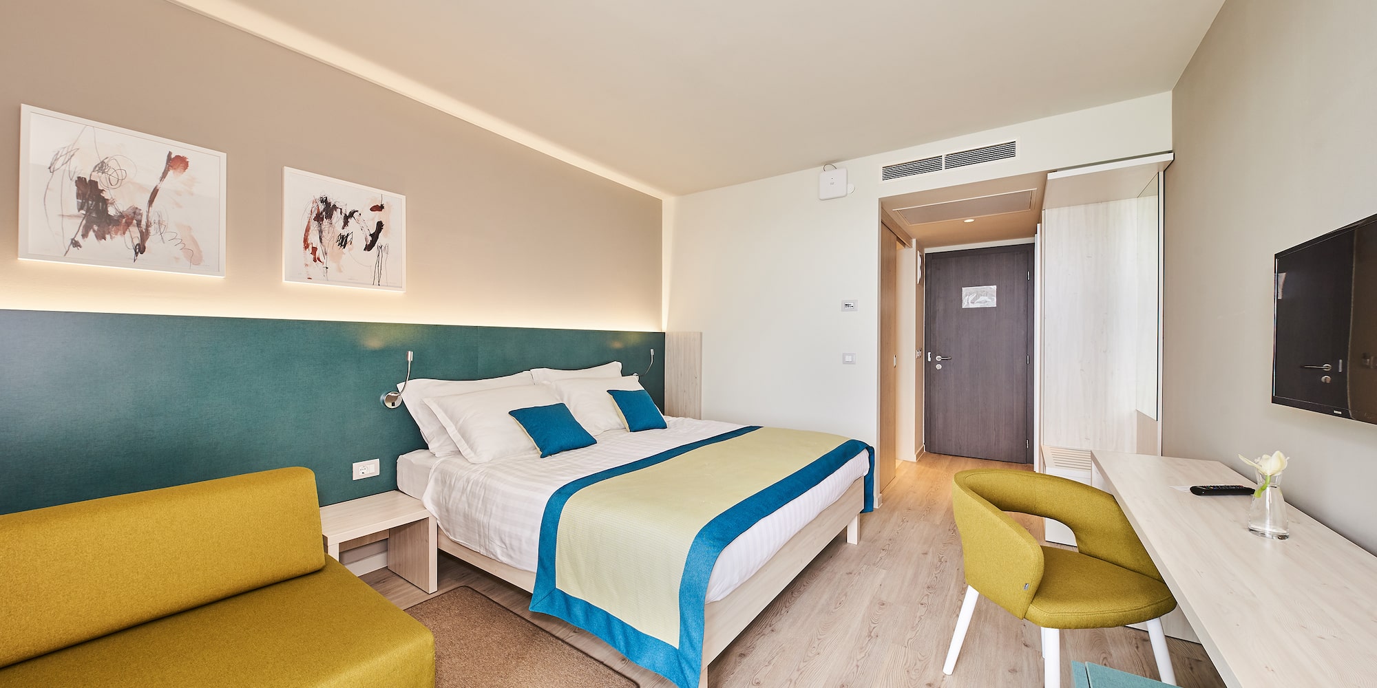 a room with a bed and a chair