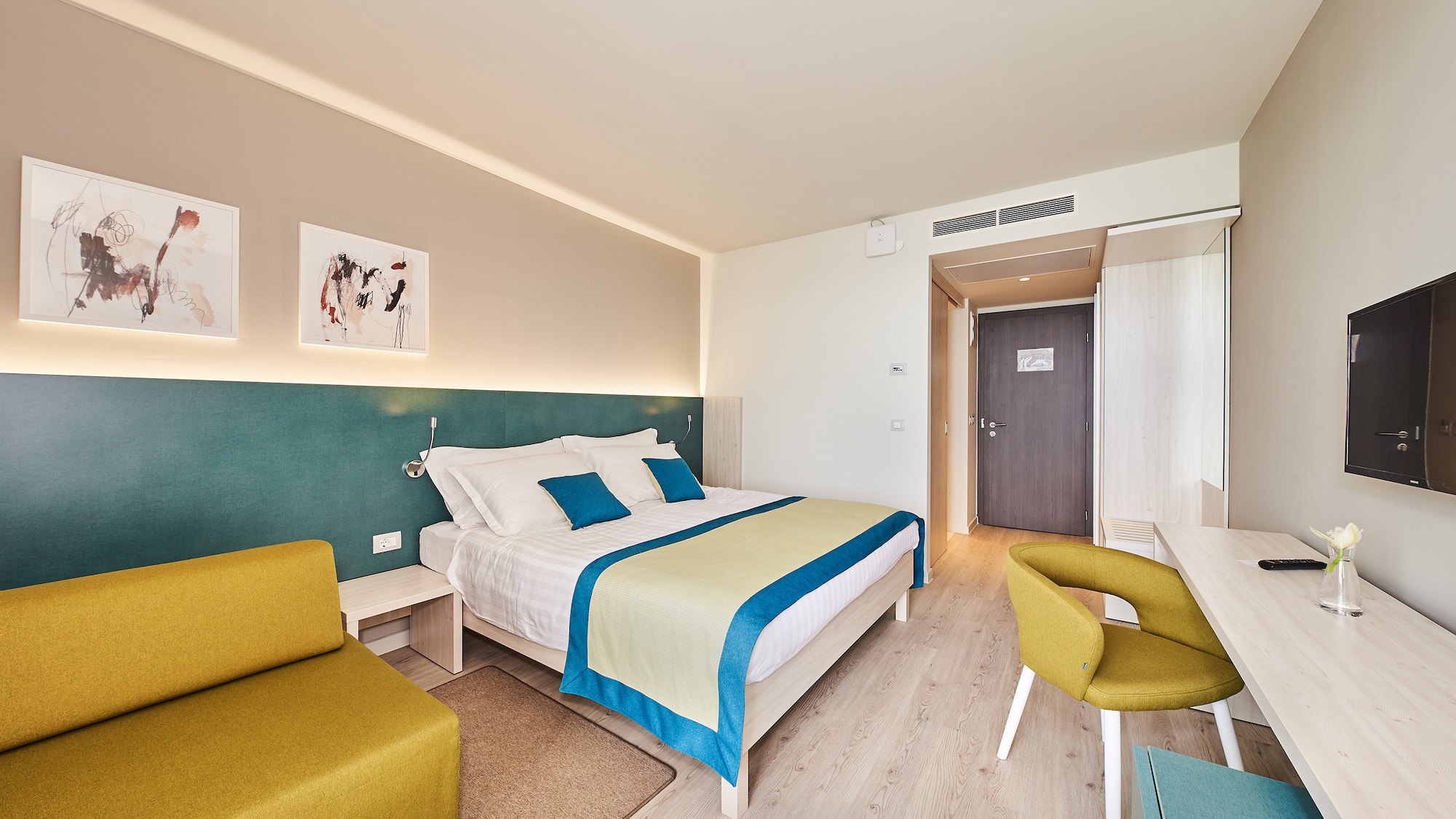 a room with a bed and a chair