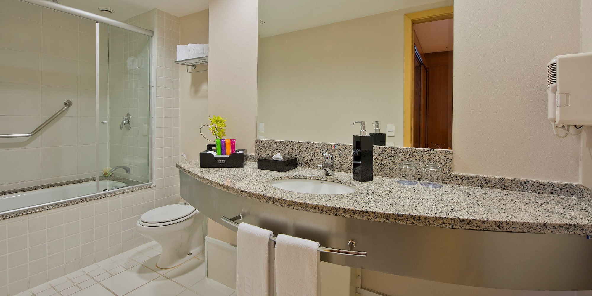 a bathroom with a sink and a shower