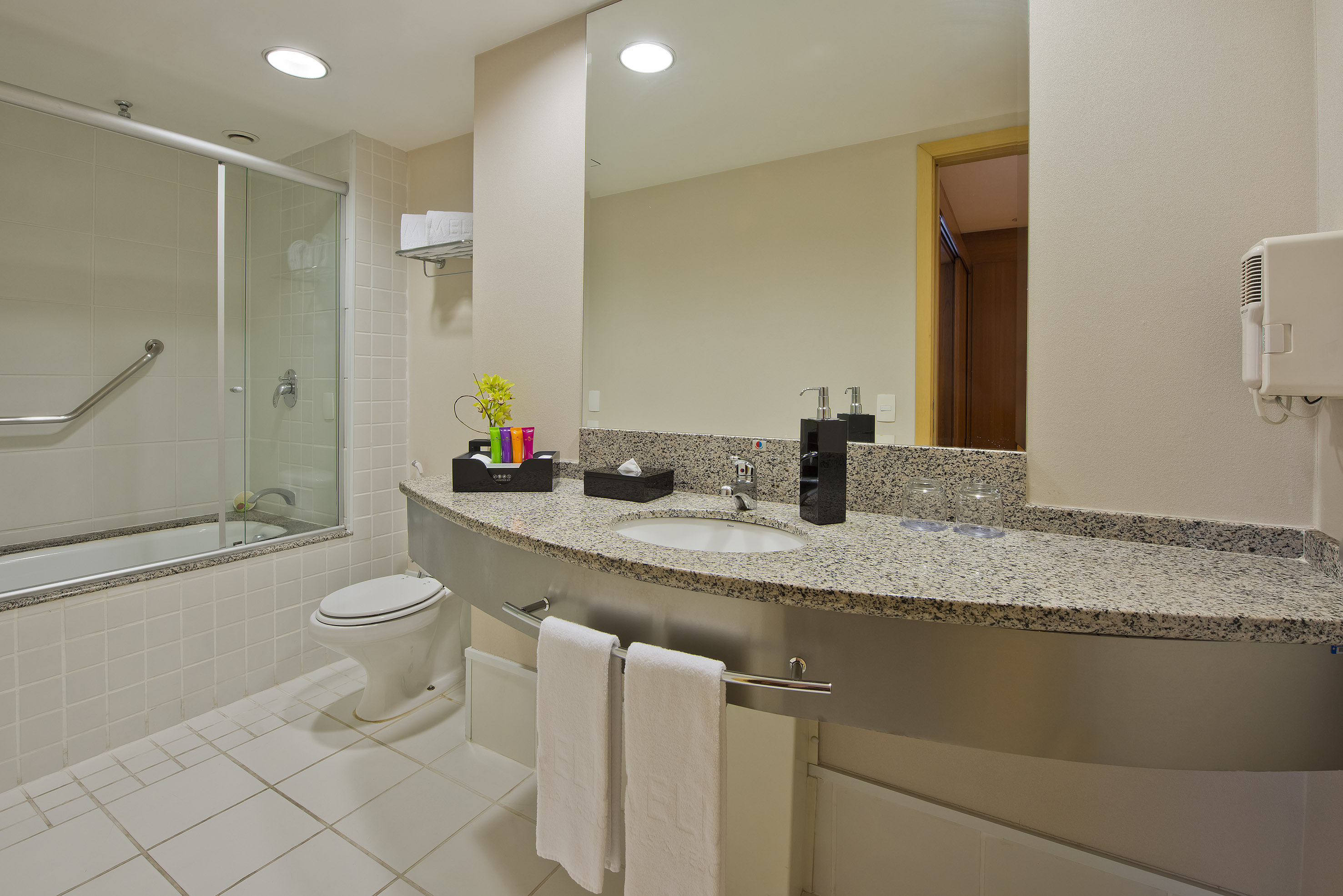 a bathroom with a sink and a shower