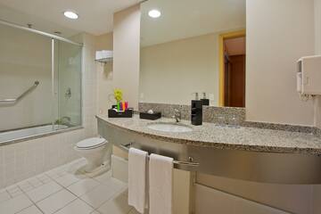 a bathroom with a sink and a shower