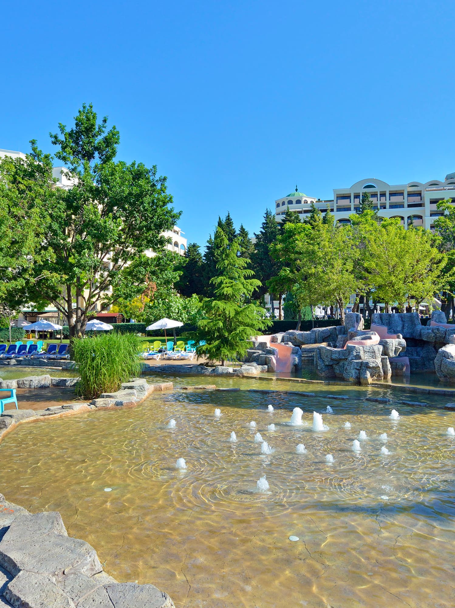 a water fountain in a park