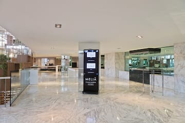 a large marble floor with a sign in it