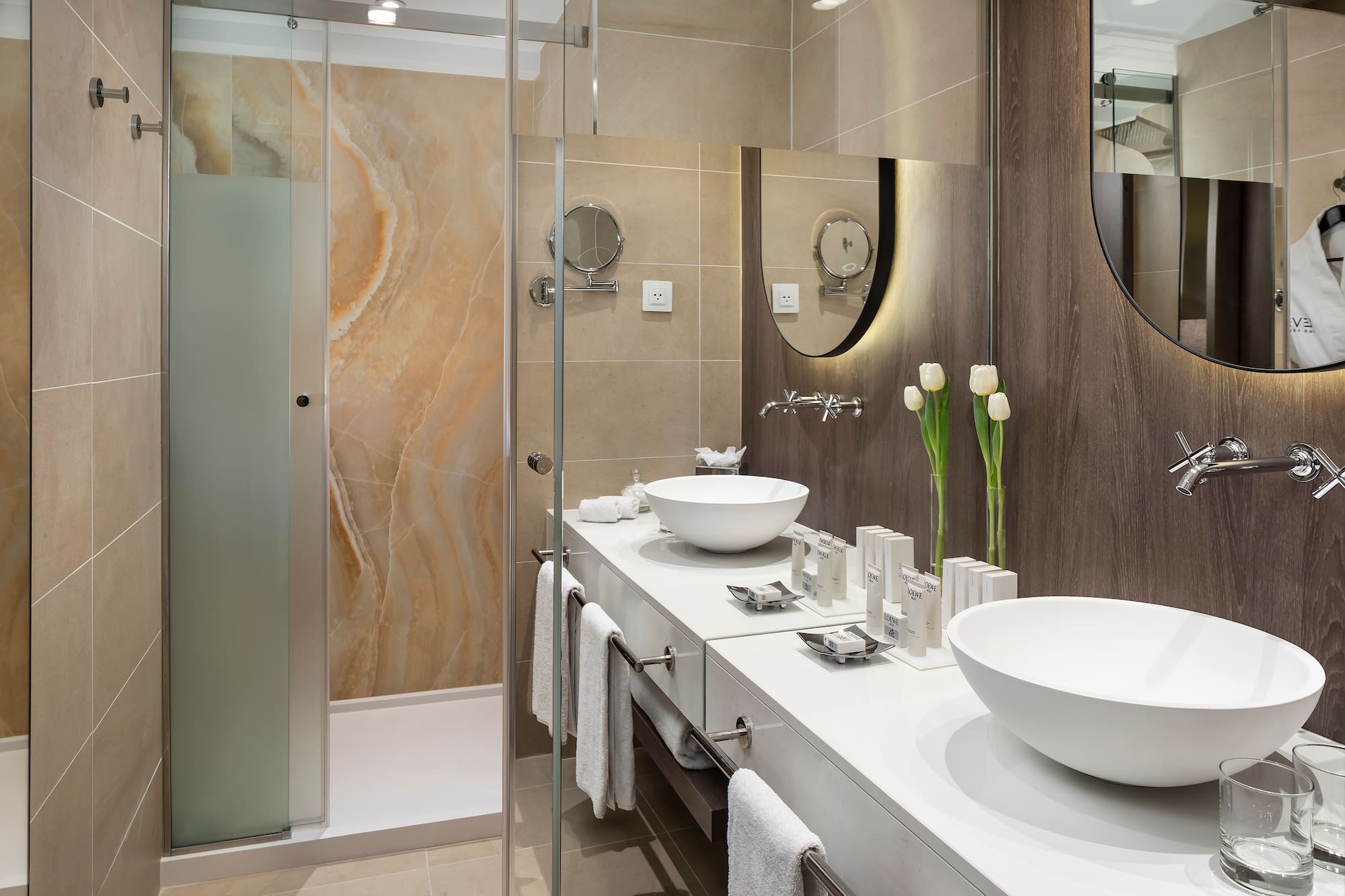 a bathroom with a shower and sink