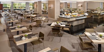 a large room with tables and chairs