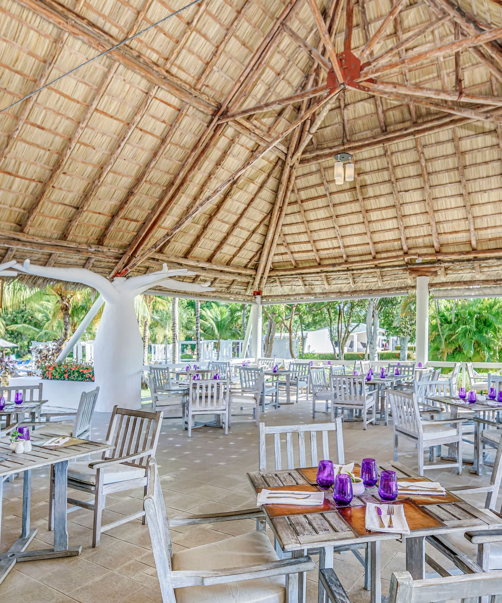 a restaurant with tables and chairs