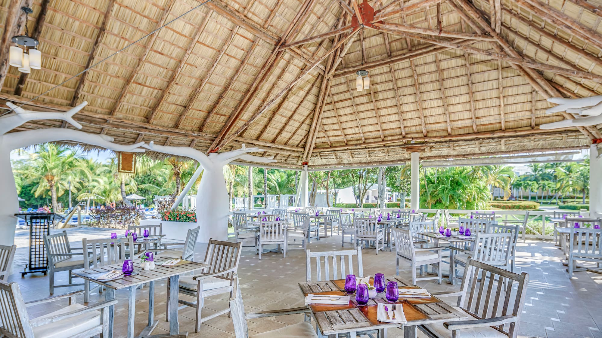 a restaurant with tables and chairs