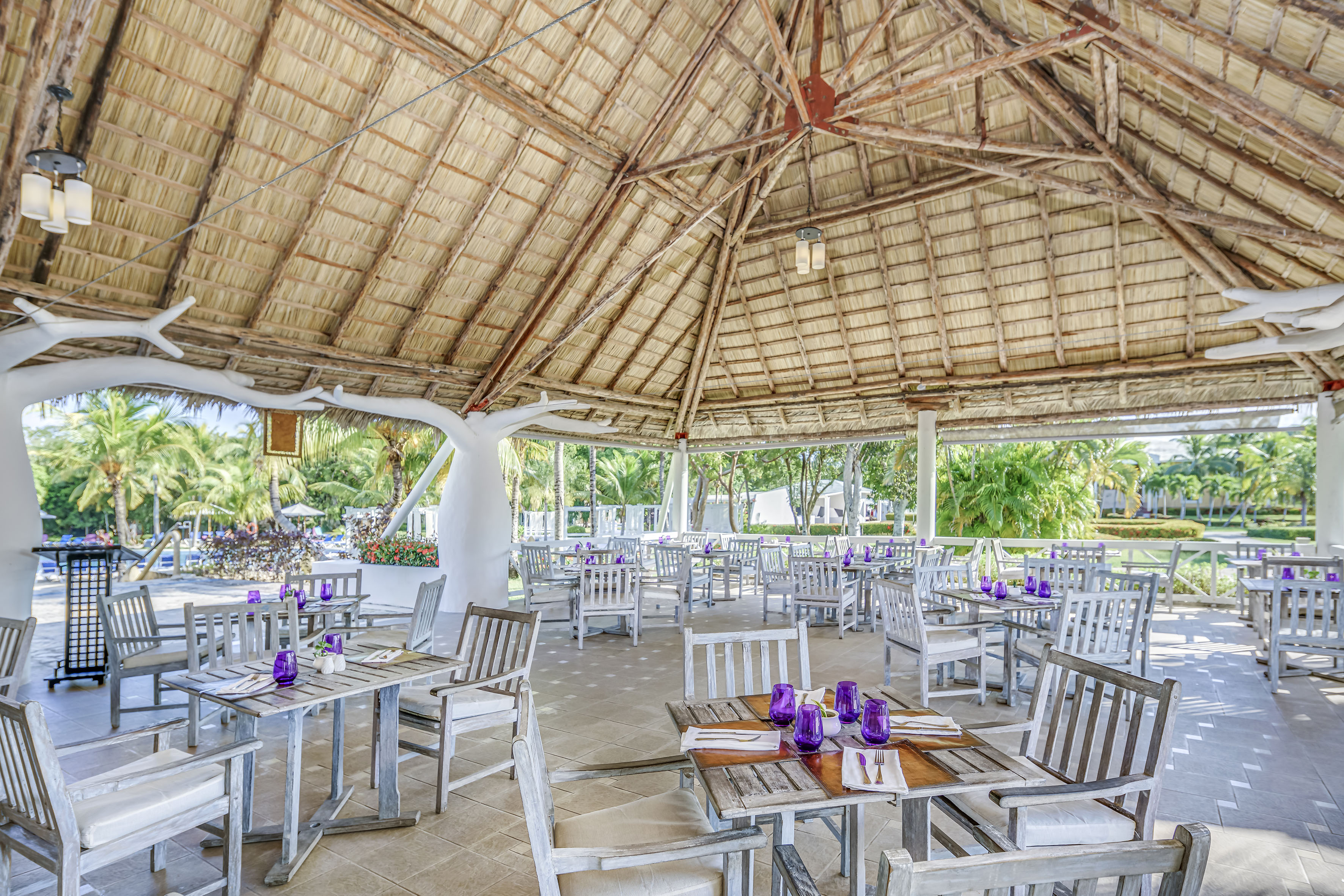 a restaurant with tables and chairs