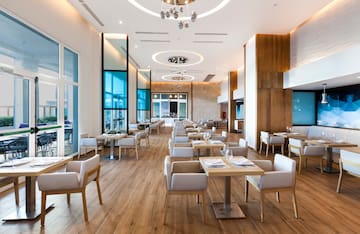 a room with tables and chairs