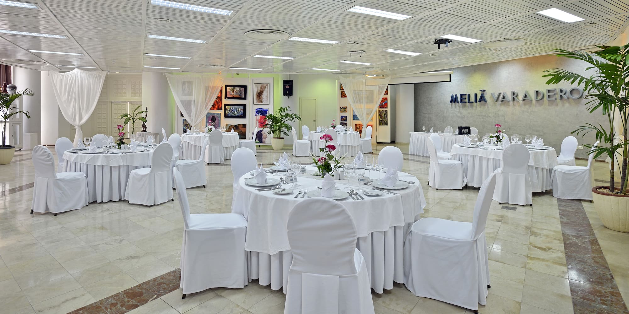 a room with tables and chairs