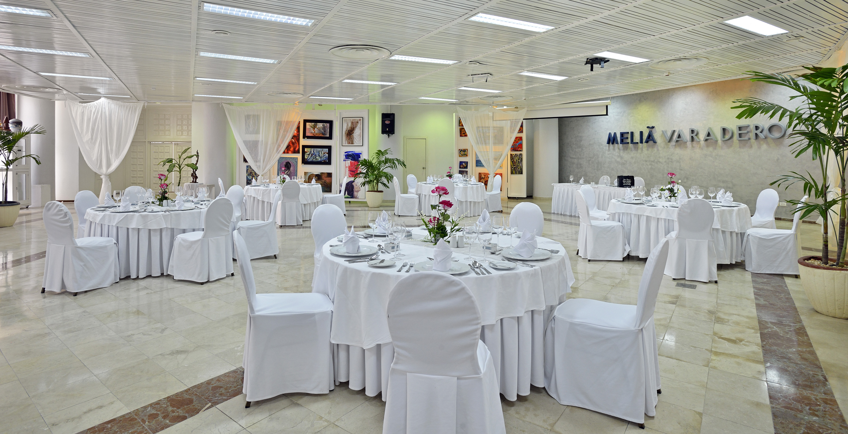 a room with tables and chairs