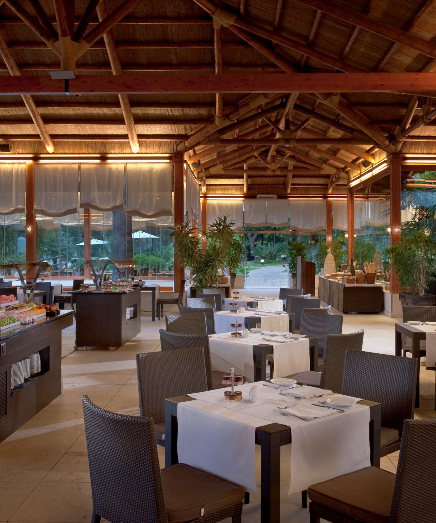 a restaurant with tables and chairs