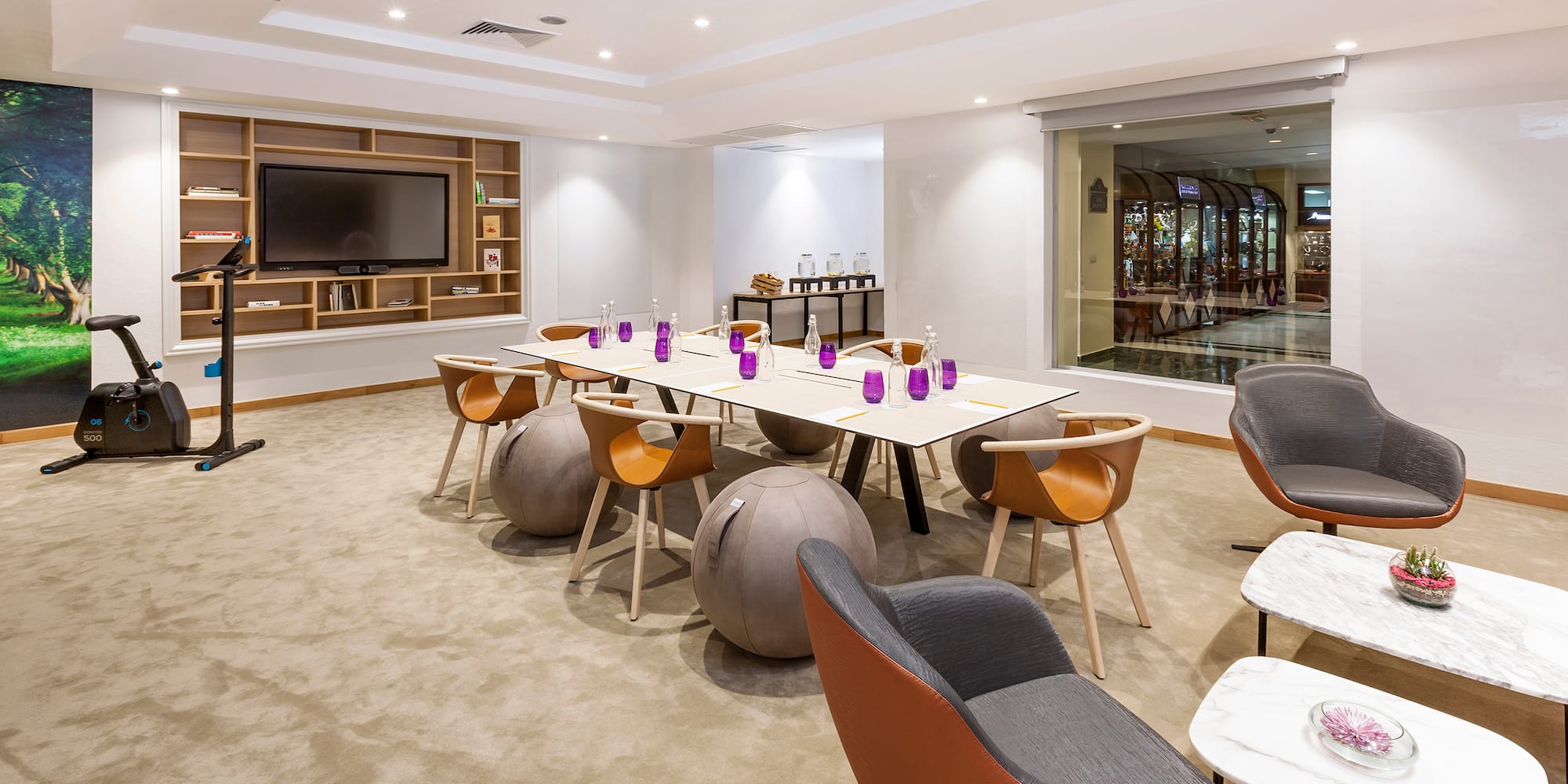 a room with a table and chairs