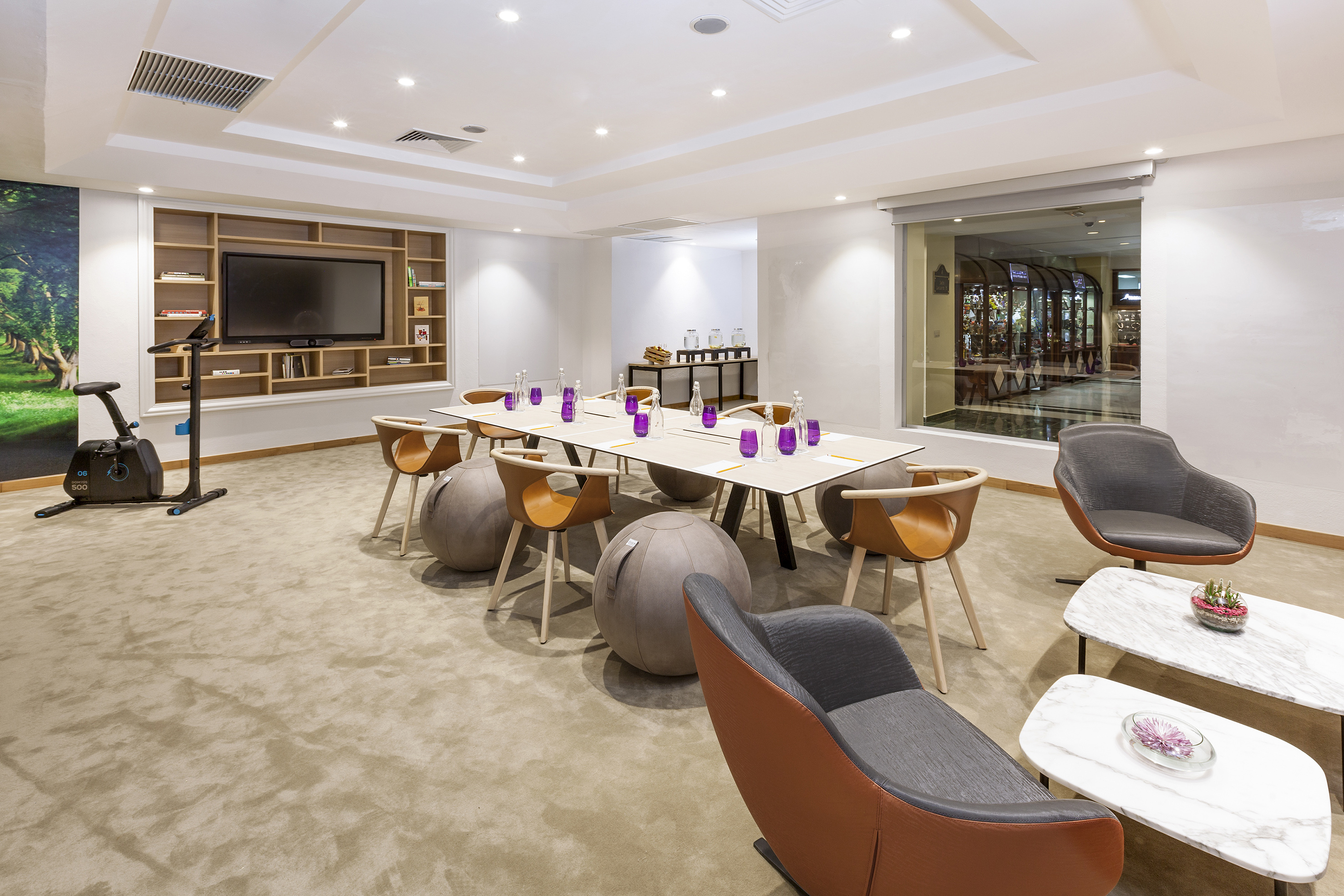 a room with a table and chairs