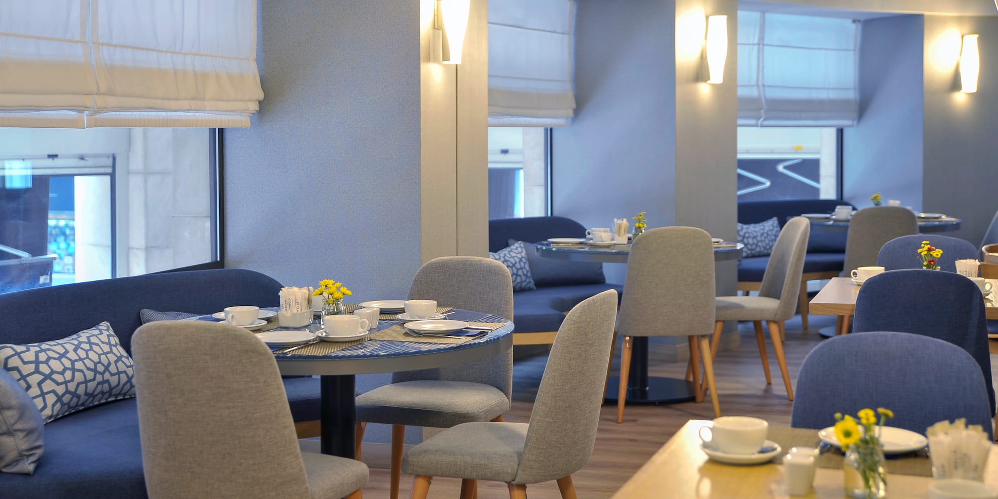 a room with tables and chairs